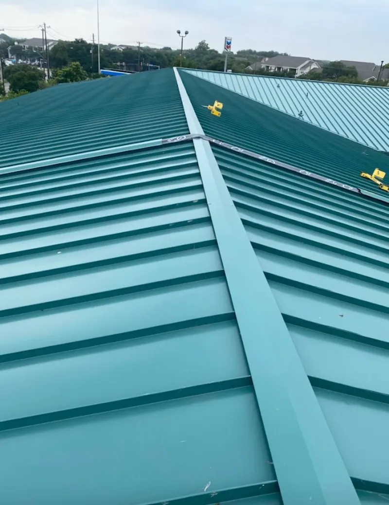 Green commercial metal roof ridge and valley for Metal Roof Repair in Gretna