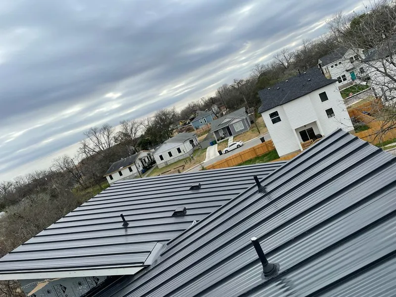 Standing seam metal roof panels with vents for Skylight Repair in Gretna